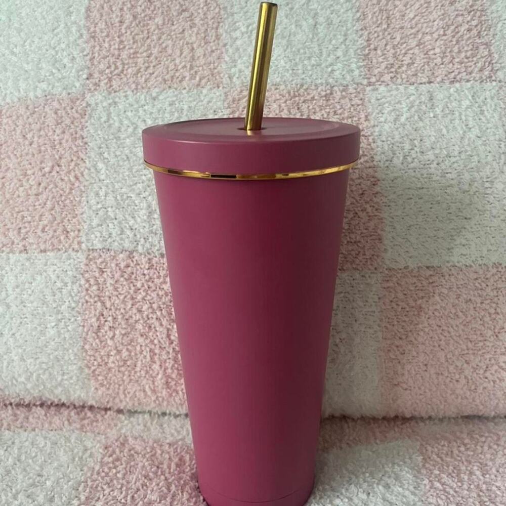 Pink metal tumbler with gold